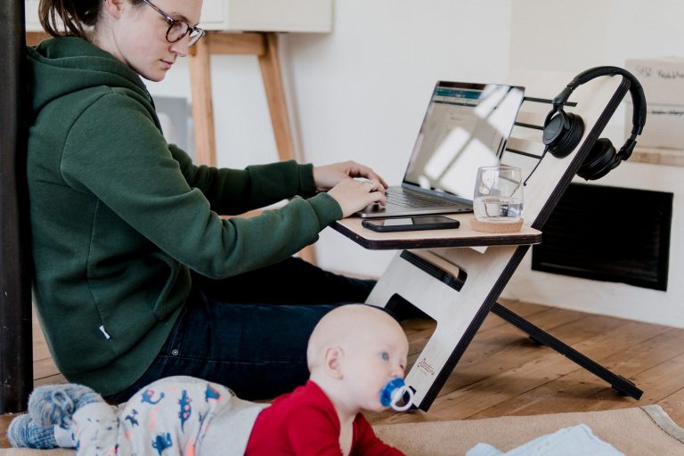 working-from-home-woman-computer-baby Working from home woman computer baby
